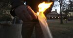 Water flowing from a man's well ignites when he puts a flame to the spigot outside his family's home in rural Parker County near Weatherford, Texas, on Nov. 27, 2012.
