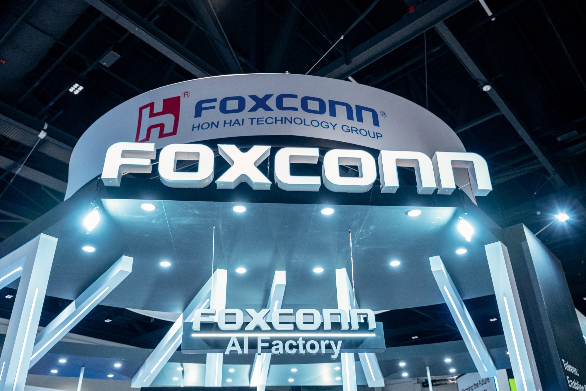 Foxconn Hon Hai Technology Group signage during the Nvidia GPU Technology Conference (GTC) in San Jose, California, US, on Thursday, March 20, 2025. Nvidia Corp., whose products have fueled a flood of artificial intelligence spending, said new types of AI models that produce more complex answers will only increase the need for computing infrastructure. Photographer: David Paul Morris/Bloomberg