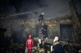 Emergency services work at the scene of a drone attack in Odesa, Ukraine, on Feb. 23.