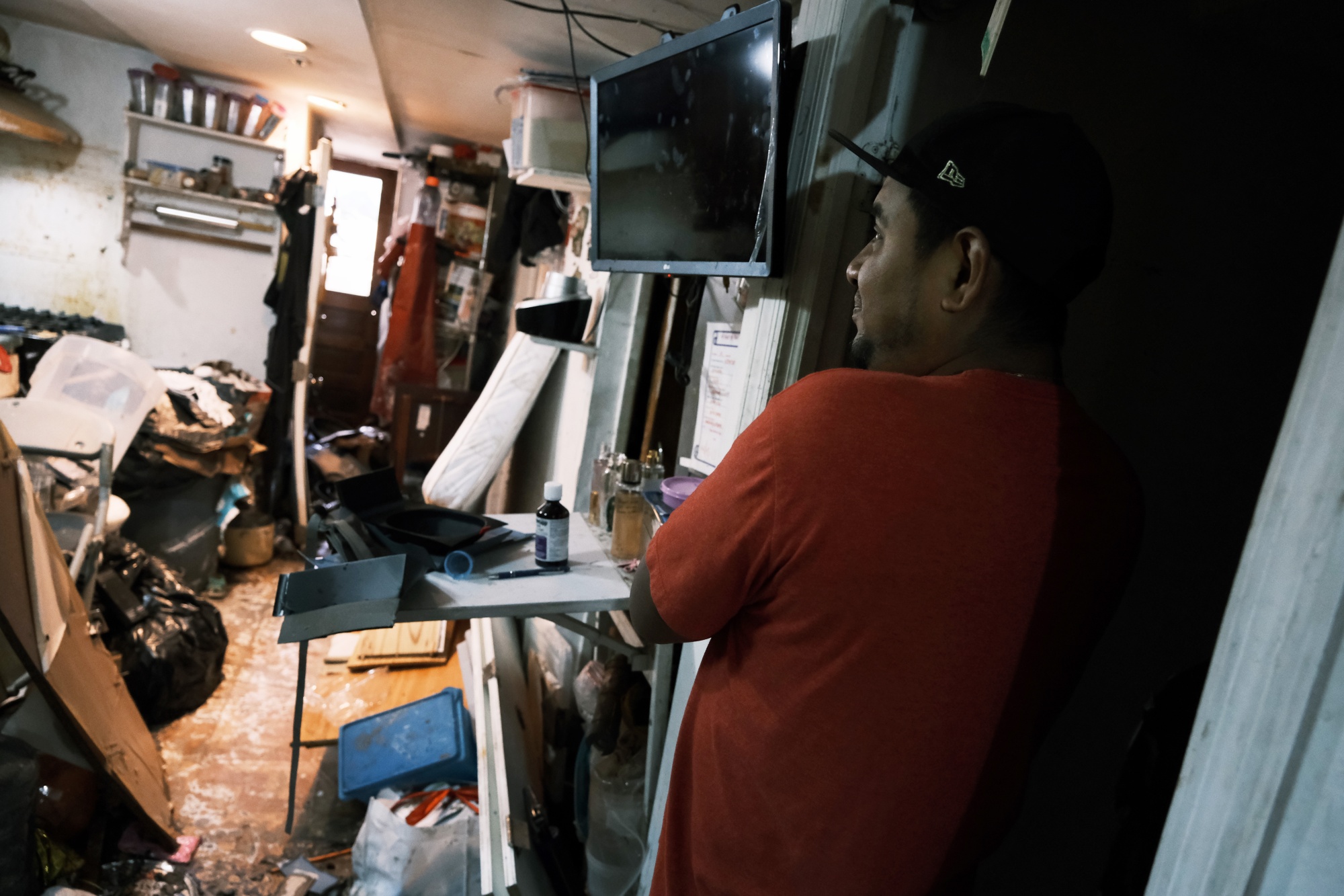 A tenant inspects a flooded basement apartment in&nbsp;Queens in the aftermath of Hurricane Ida.