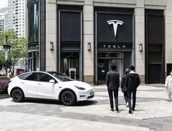 relates to Tesla Moves Top Auto Executive to China in Shakeup, WSJ Says