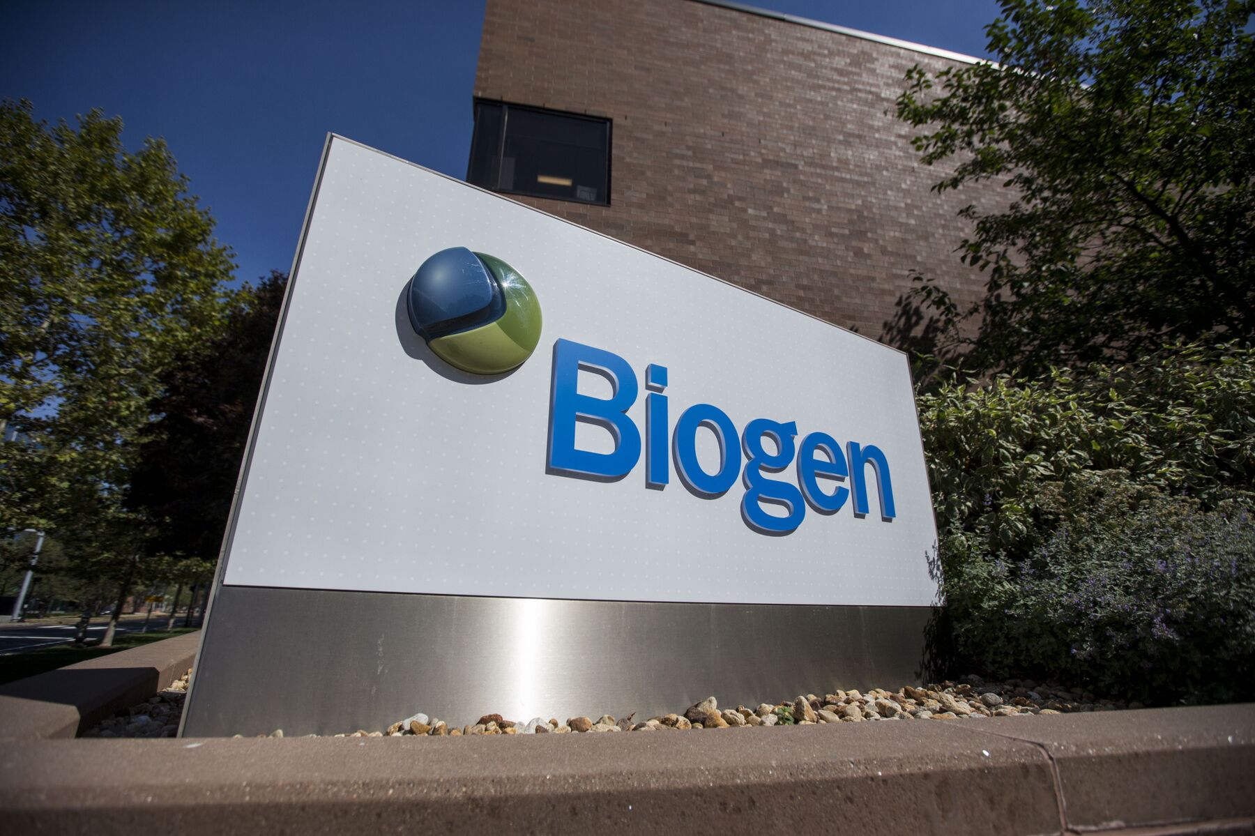 Signage is displayed in front of Biogen Inc. headquarters in Cambridge, Massachusetts, U.S.