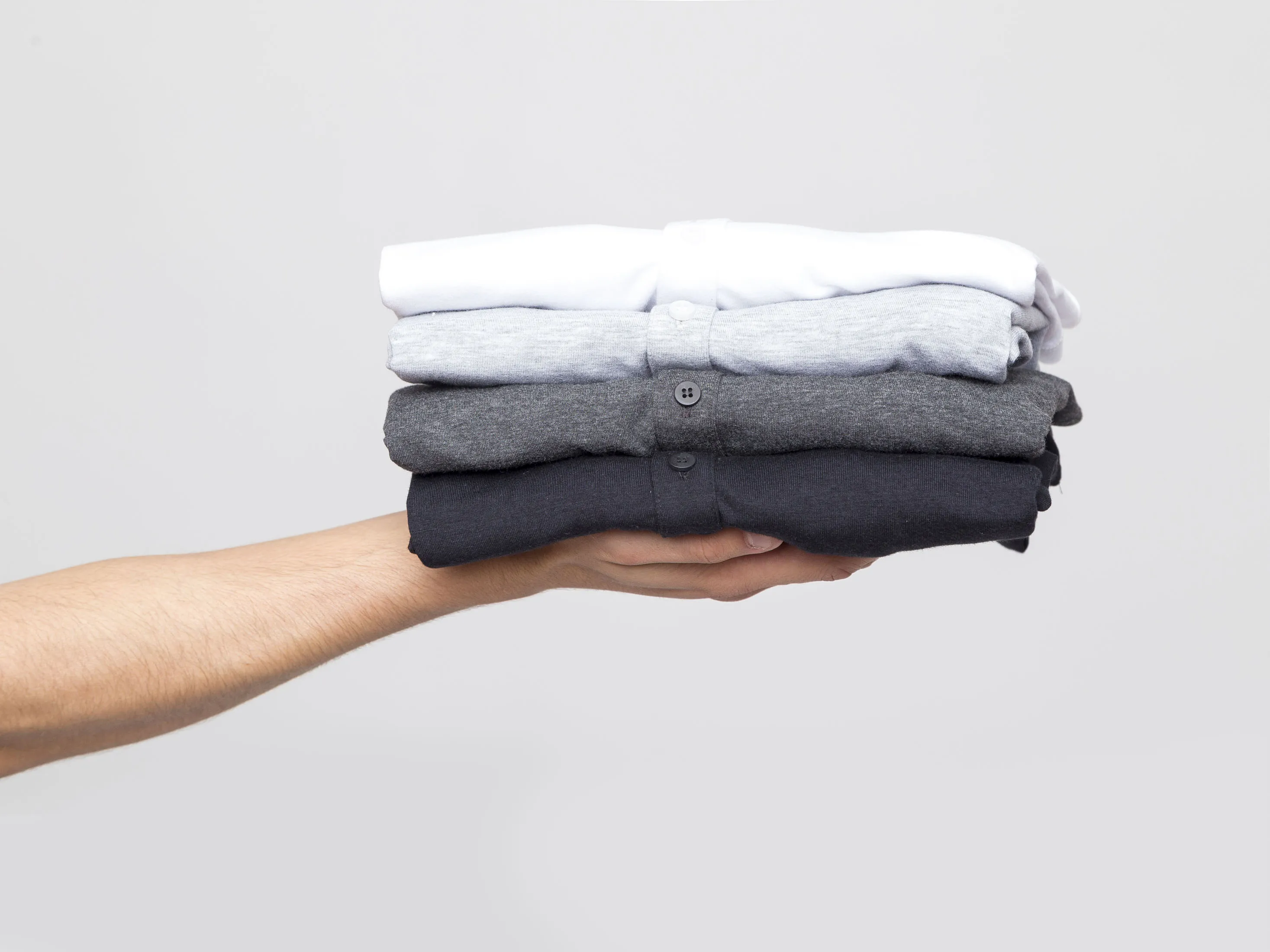 A stack of shirts from Two Blind Brothers.