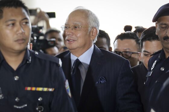 Najib Faces Bribery Charges Linked to 1MDB Bond, M&A Deals