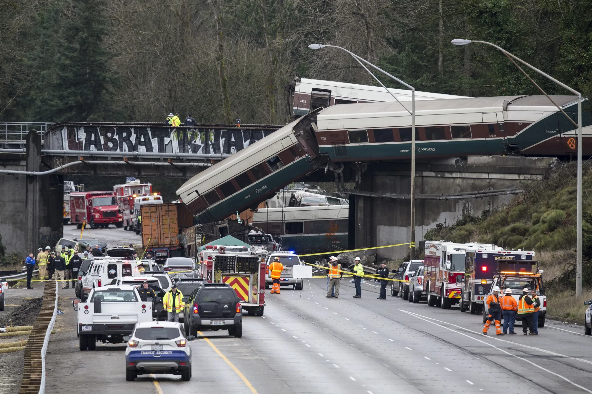 Emergency crews work at the scene of a Amtrak train derailment in DuPont, Washington, on Dec. 18, 2017.