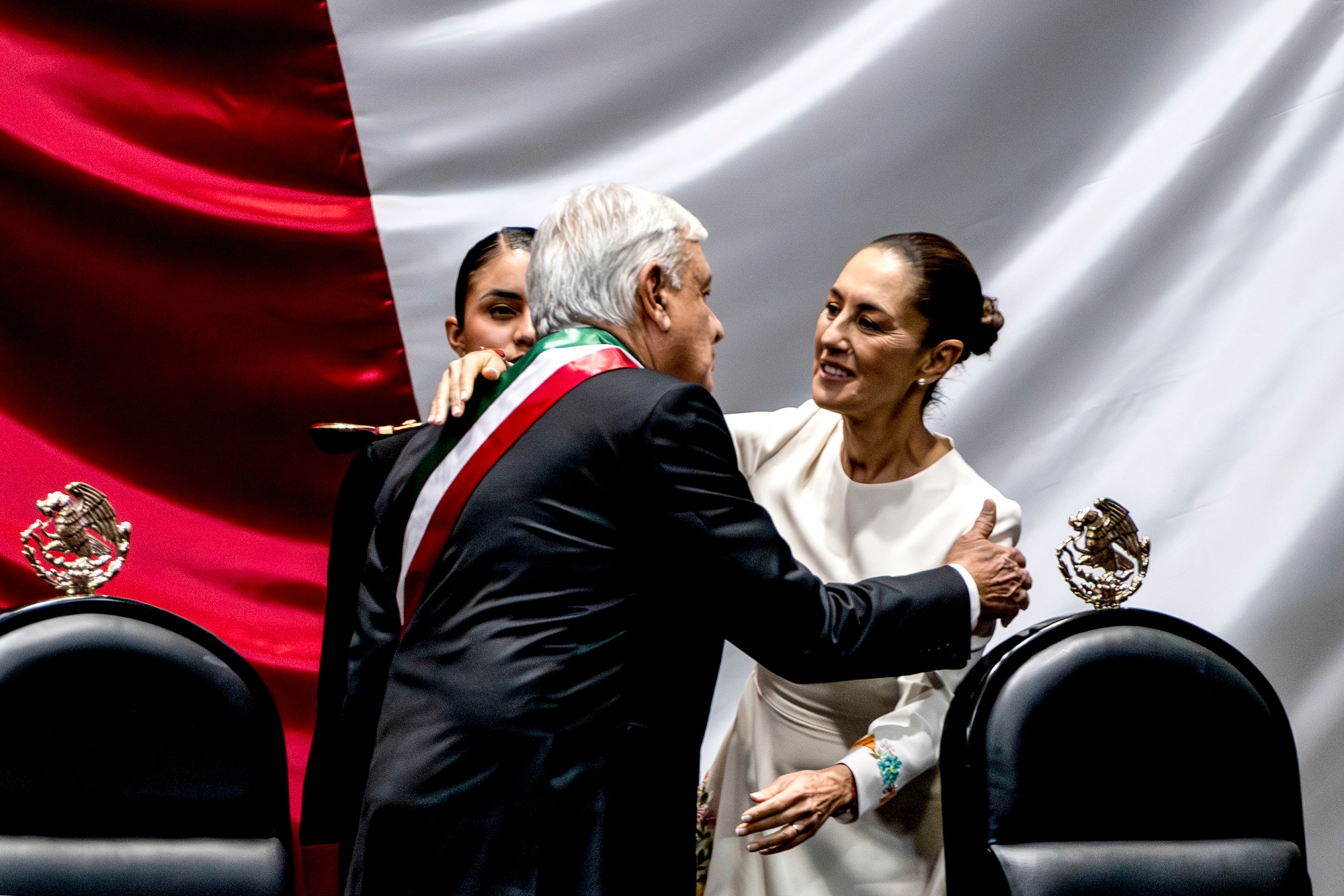 Claudia Sheinbaum, Mexico’s president-elect, right, and Andres Manuel Lopez Obrador, Mexico's president, embrace during an inauguration ceremony at the Saint Lazarus Legislative Palace in Mexico City, Mexico, on Tuesday, Oct. 1, 2024. Sheinbaum was sworn in for a six-year term as Mexico’s first female president on Oct. 1, succeeding her mentor, Andres Manuel Lopez Obrador, after having won 60% of the country’s vote. Photographer: Stephania Corpi/Bloomberg