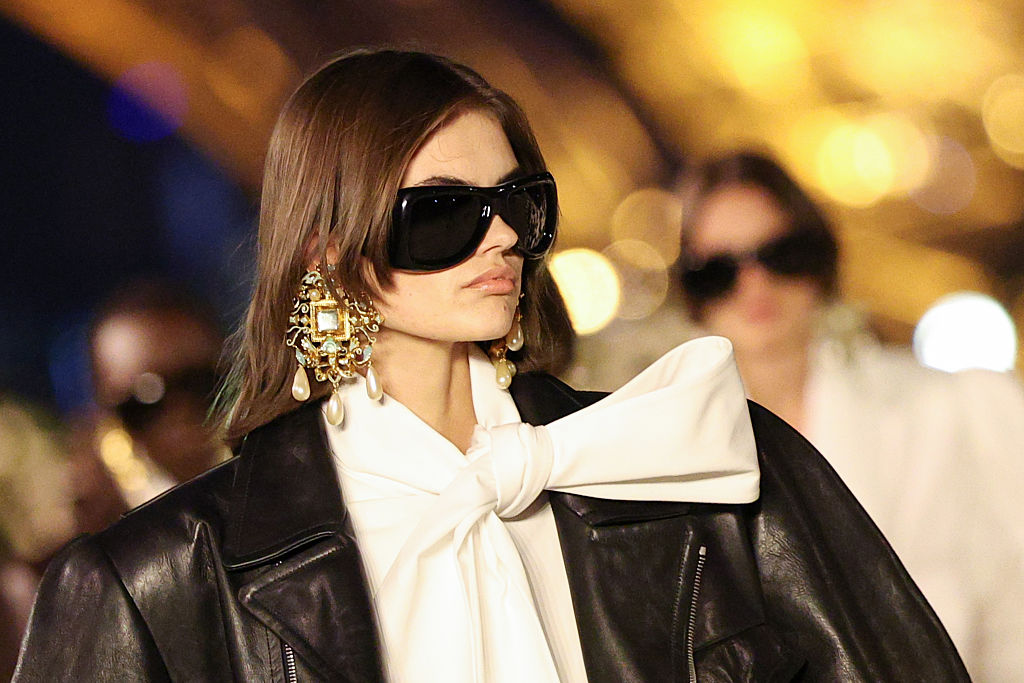 PARIS, FRANCE - SEPTEMBER 29: (EDITORIAL USE ONLY - For Non-Editorial use please seek approval from Fashion House) A model walks the runway during the Saint Laurent Womenswear Spring/Summer 2026 show as part of Paris Fashion Week on September 29, 2025 in Paris, France. (Photo by Stephane Cardinale - Corbis/Corbis via Getty Images)