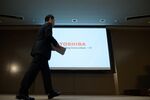 Masayoshi Hirata, corporate executive vice president and chief financial officer of Toshiba Corp., arrives at a news conference in Tokyo.
