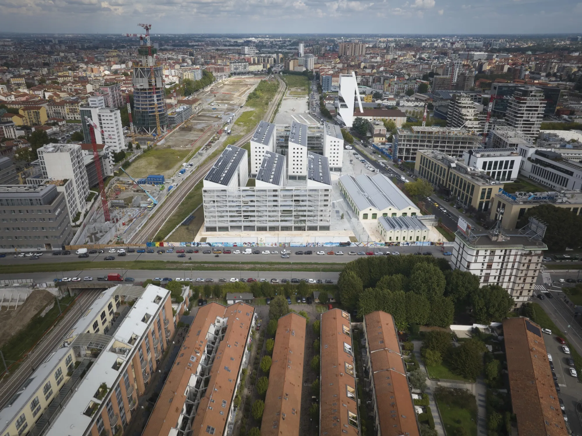 Milan's new athlete's complex at Porta Romana, shown here in rendering, is the first building&nbsp;completed on fomer railway yards just south of the city center.