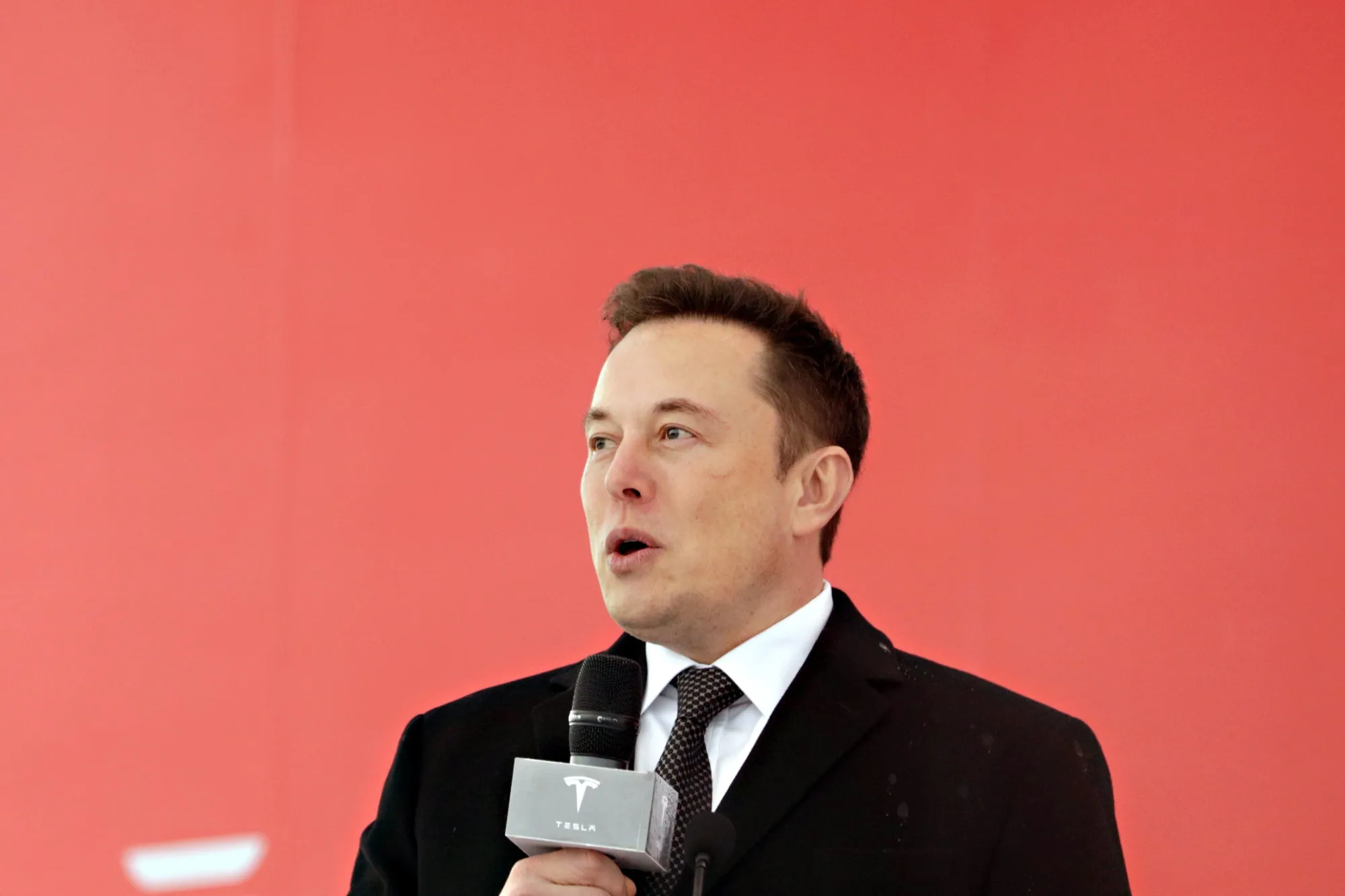 Elon Musk speaks during an event at the site of the company's manufacturing facility in Shanghai on&nbsp;Jan. 7, 2019.