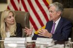 Jerome Powell, chairman of the U.S. Federal Reserve, speaks while Lael Brainard, governor of the U.S. Federal Reserve, left, listens during a Fed Listens event on "Perspectives on Maximum Employment and Price Stability" at the Federal Reserve in Washington, D.C., U.S., on Friday, Oct. 4, 2019.