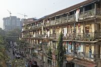A chawl dwelling decorated with paper lanterns for the Diwali festival in Mumbai.