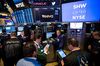 Traders work on the floor of the New York Stock Exchange (NYSE) in New York, U.S., on Friday, June 1, 2018. Stocks rallied and bonds fell as the latest U.S. jobs data bolstered optimism in the economy, all but�solidifying�a rate hike later this month.