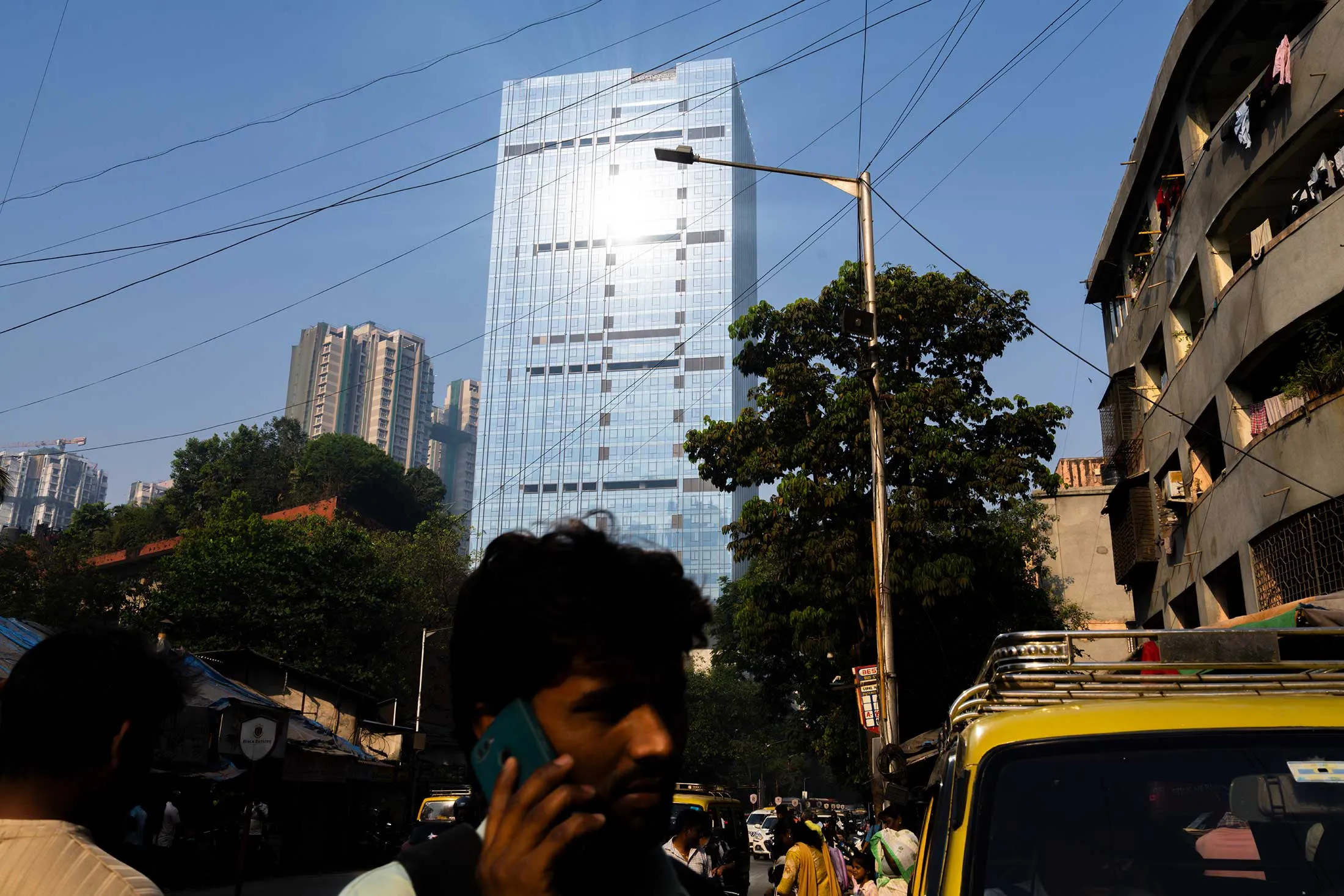 The morning commute in Mumbai, with the Altimus tower in the background.