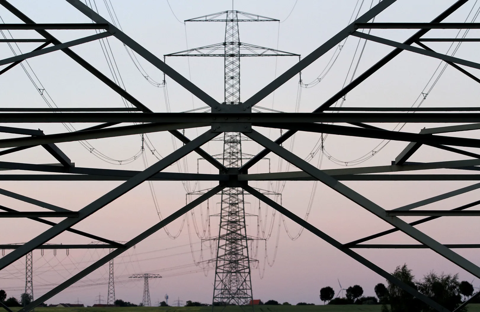 Electric power lines and pylons in the countryside near Berlin.
