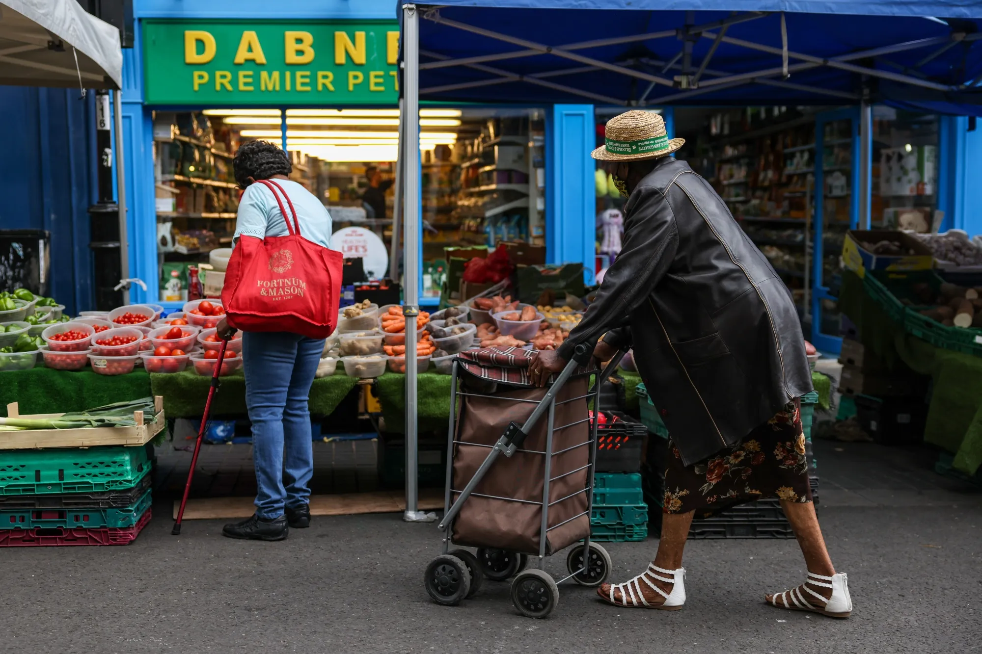 Shoppers at Surrey Street Market in Croydon, UK.
