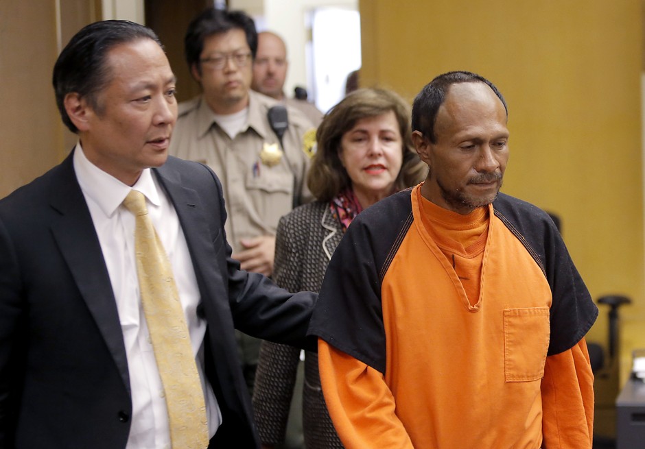 Francisco Sanchez, right, is lead into the courtroom by San Francisco Public Defender Jeff Adachi, left, and Assistant District Attorney Diana Garcia, center, for his arraignment Tuesday in San Francisco.