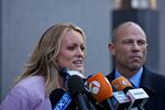 Stormy Daniels, left, speaks while attorney Michael Avenatti listens outside Federal Court in New York in 2018.