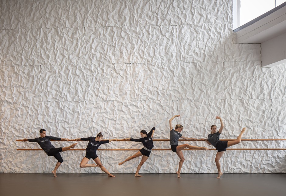 Dancers at the Reach rehearse in Studio J, which features crinkle-concrete walls.