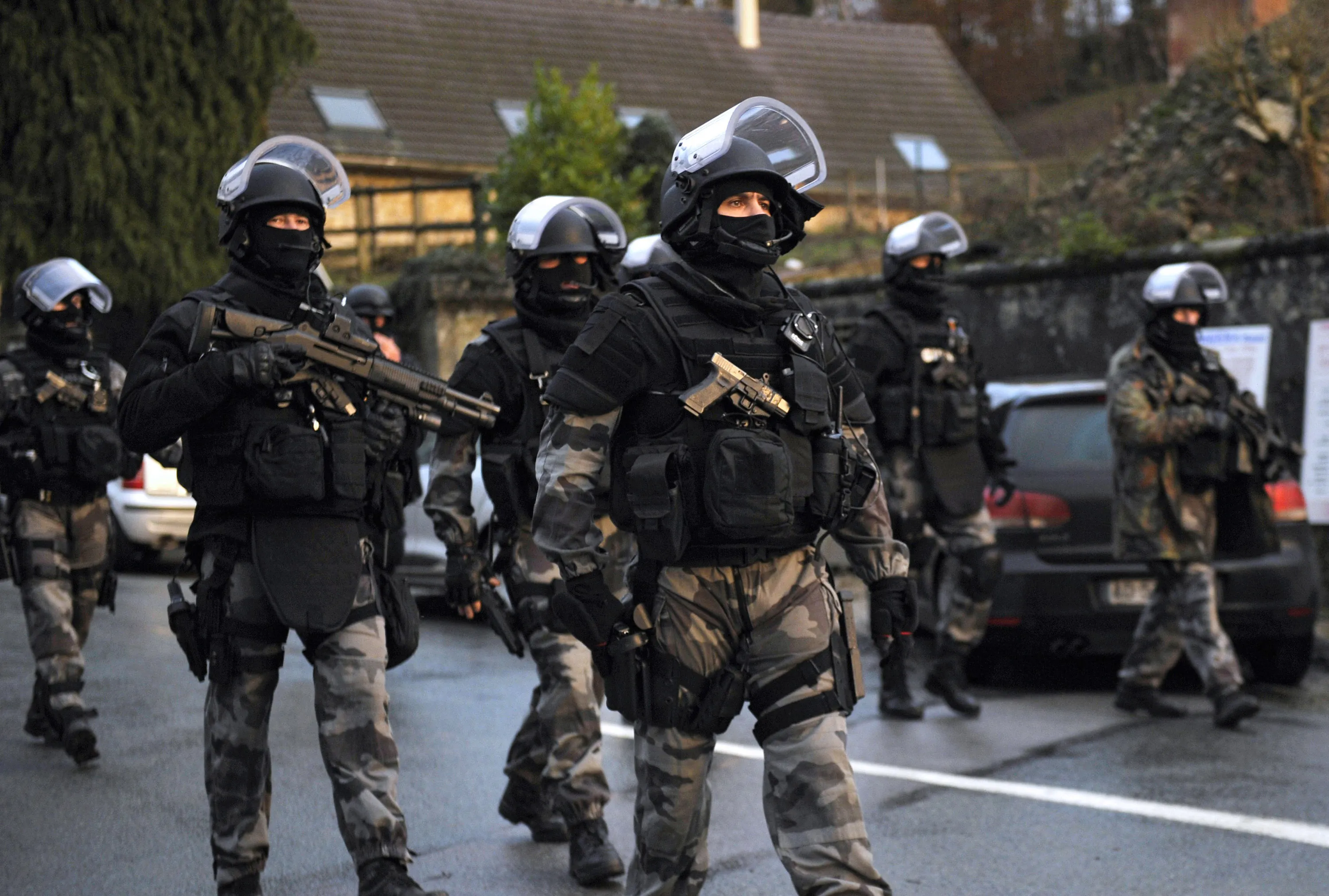 Members of French police special forces patrol in Corcy, northern France, on Jan. 8, 2015.
