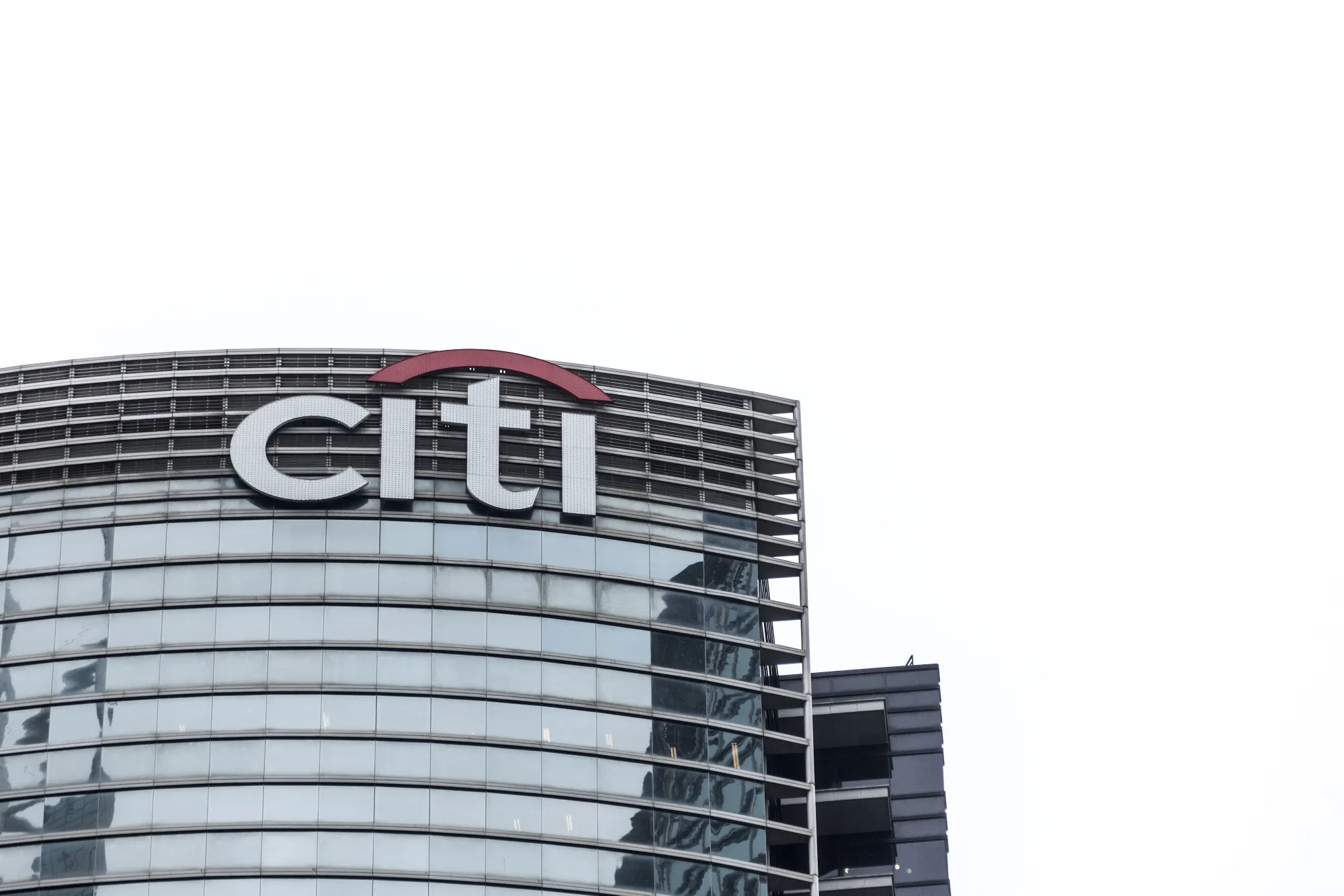 The Citigroup Inc. logo is displayed atop the Champion Tower in Hong Kong.