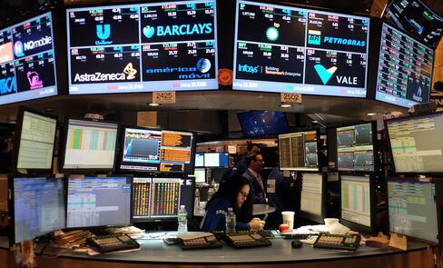 Traders work on the floor of the New York Stock Exchange.