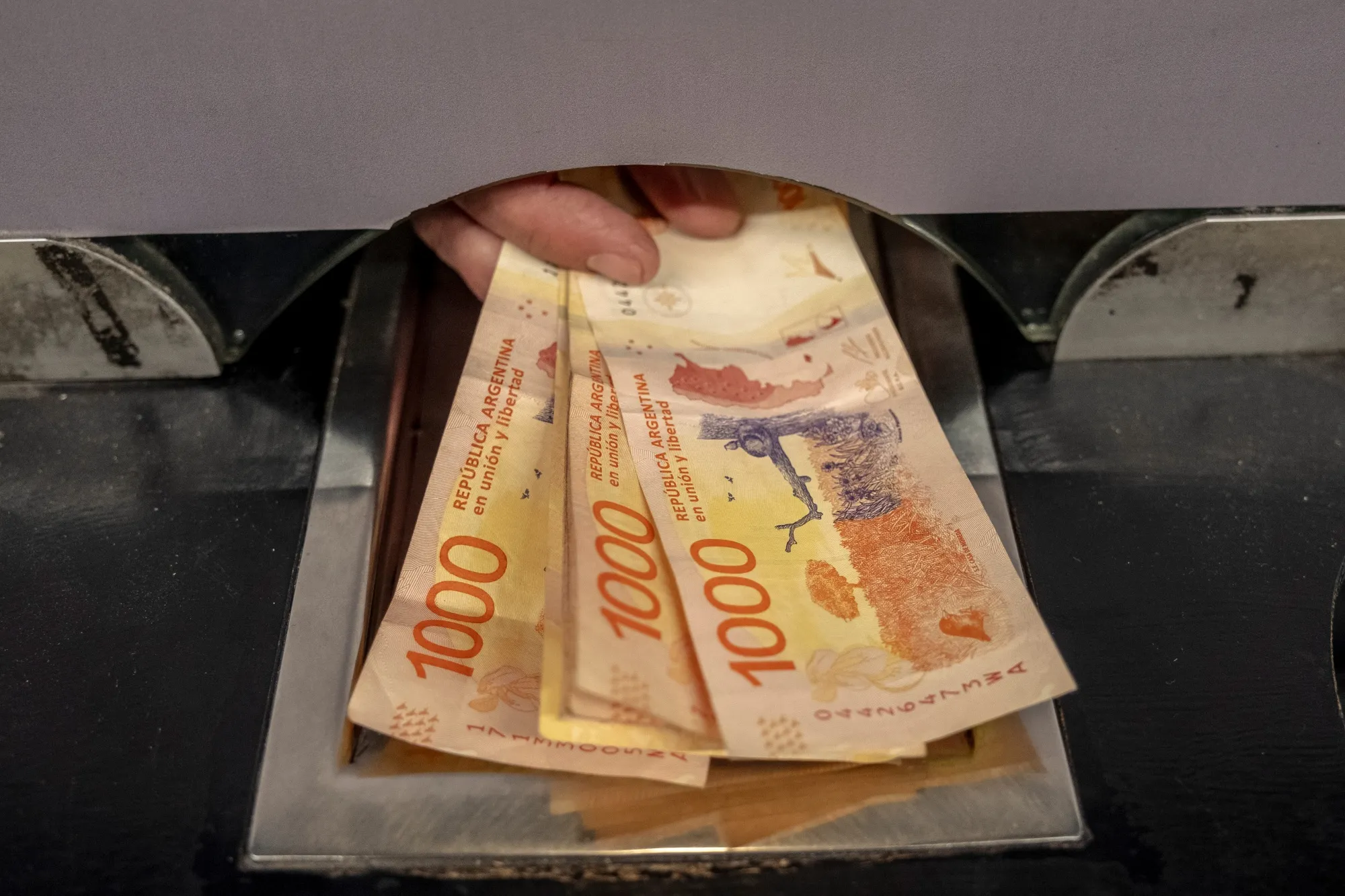 Argentina Tightens FX Rules Again for Banks as Peso Wavers - Bloomberg