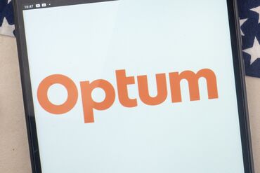 In this photo illustration, Optum, Inc. logo seen displayed