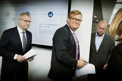 Michael Pram Rasmussen, center, and Soren Skou on Sept. 22.