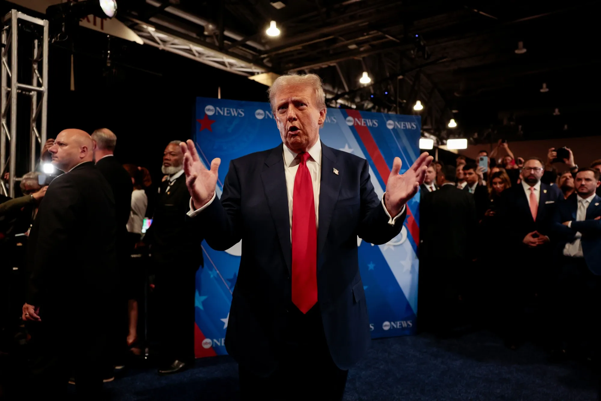 Donald Trump speaks to the media in the spin room following the second presidential debate at the Pennsylvania Convention Center in Philadelphia, Pennsylvania, on Sept. 10.