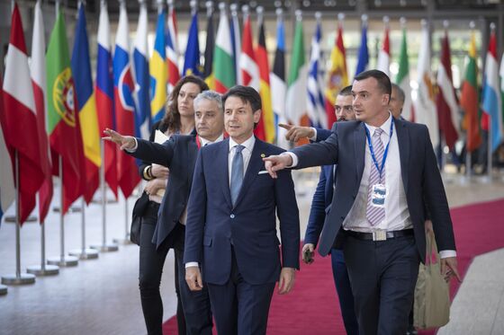 Macron's Bow to Italy Paves Way for Possible EU Migration Deal