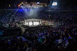 Spectators watch a bout during The One: Kings & Conquerors event at the Venetian Macao in Macau