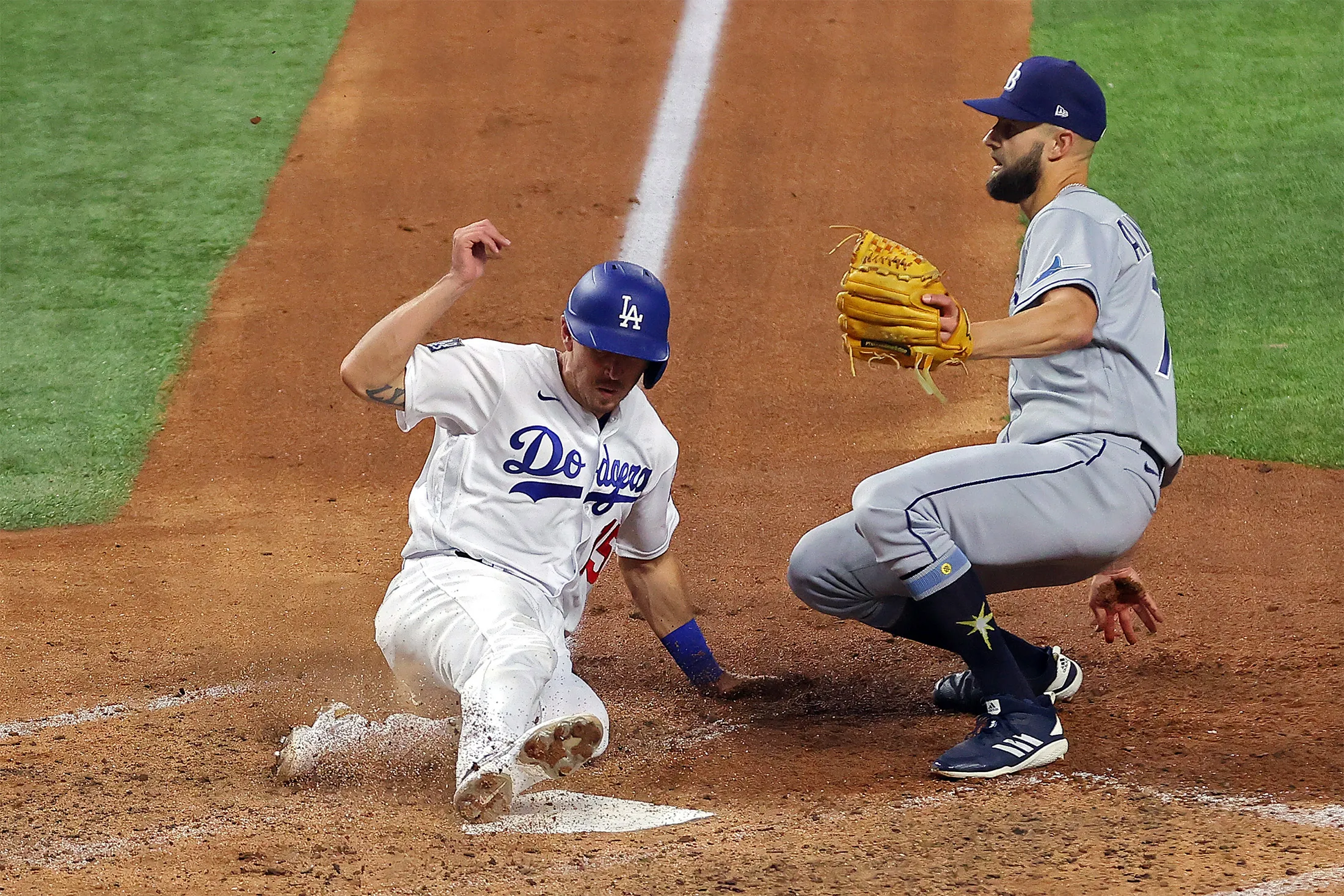 Austin Barnes of the Los Angeles Dodgers scores a run during during Game Six of the MLB World Series on Oct. 27.