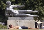 A sunbather in the Tuileries Gardens, a park with a somewhat more relaxed approach than most