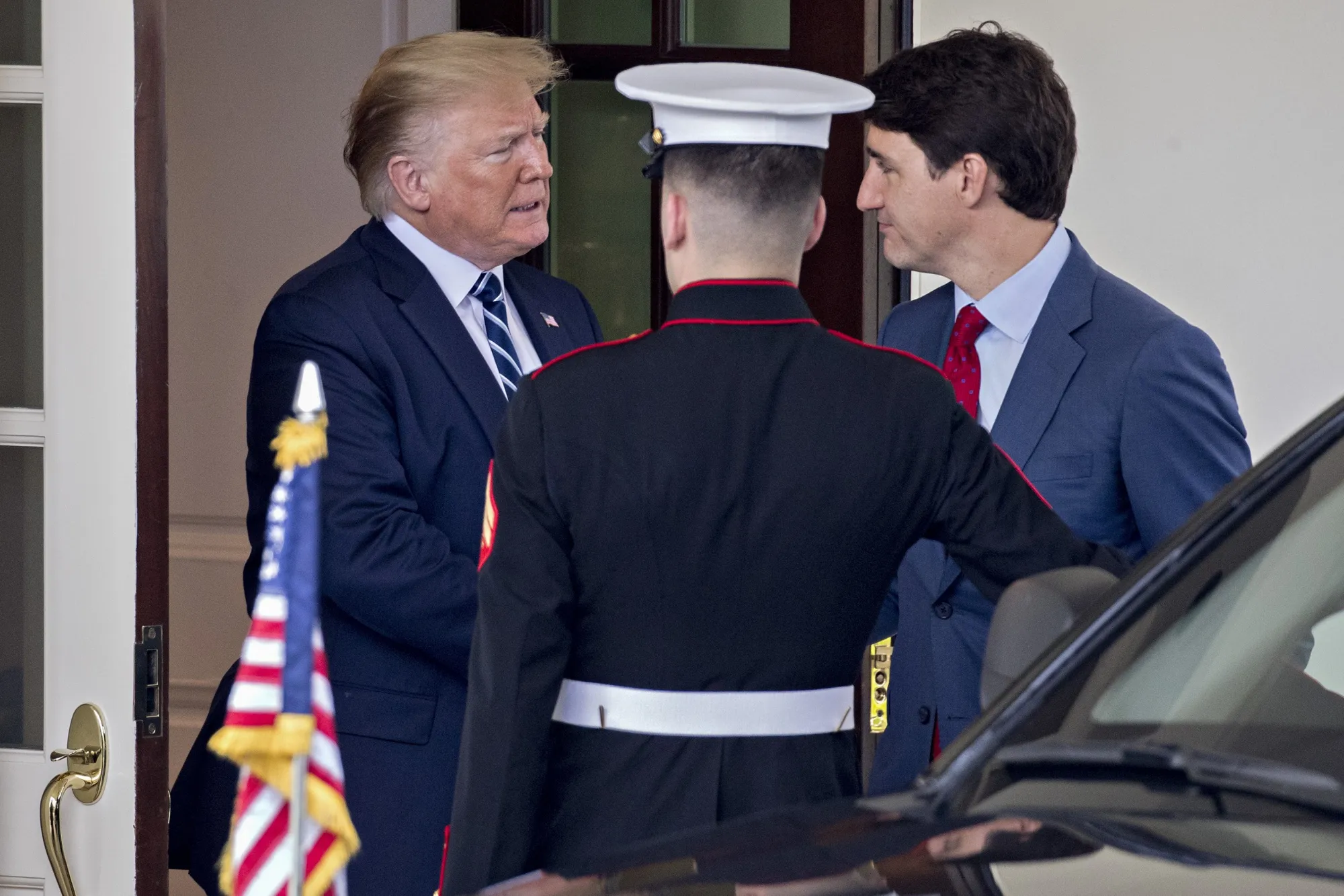 Donald Trump shakes hands with Justin Trudeau at the West Wing of the White House in June 2019. 