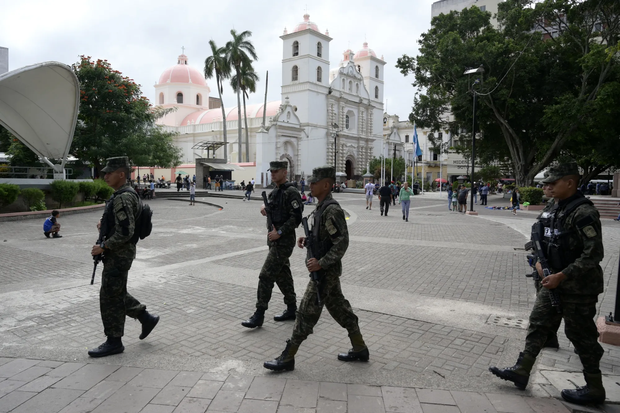 Soldiers patrol the Central Park in front of the San Miguel Arcangel Cathedral in Tegucigalpa on November 1.&nbsp;