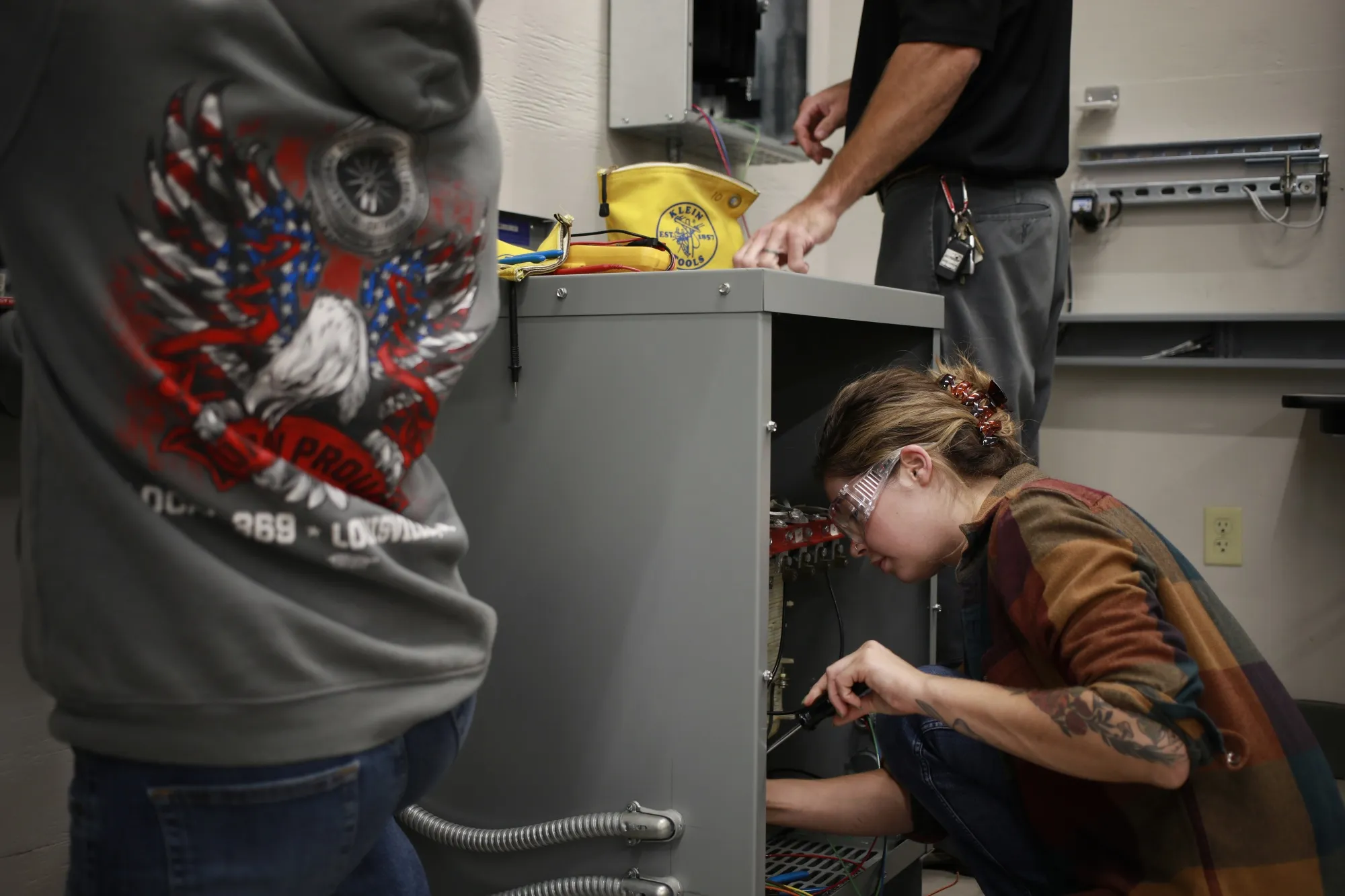 Electrician apprentices work on wiring transformers at a trade school in Louisville, Kentucky.&nbsp;