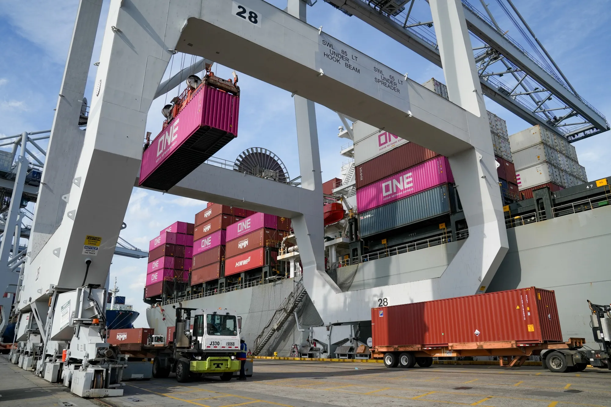Cranes are used to offload containers from a ship at the Port of Savannah in Savannah in March.