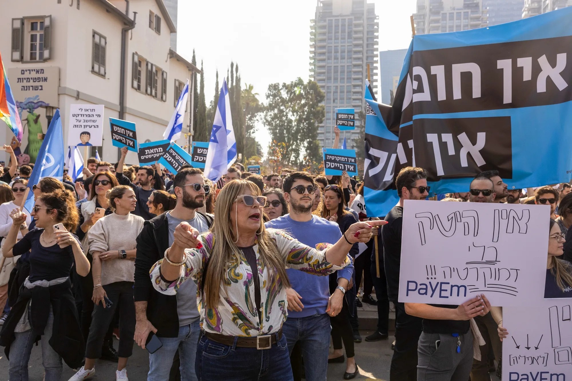 Demonstrators hold placards during a protest by tech workers against proposed judicial reforms in Tel Aviv,&nbsp;on&nbsp;Jan. 24.