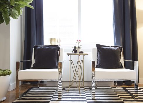 Chairs, though maybe not for seating, in a room by Will Saks.