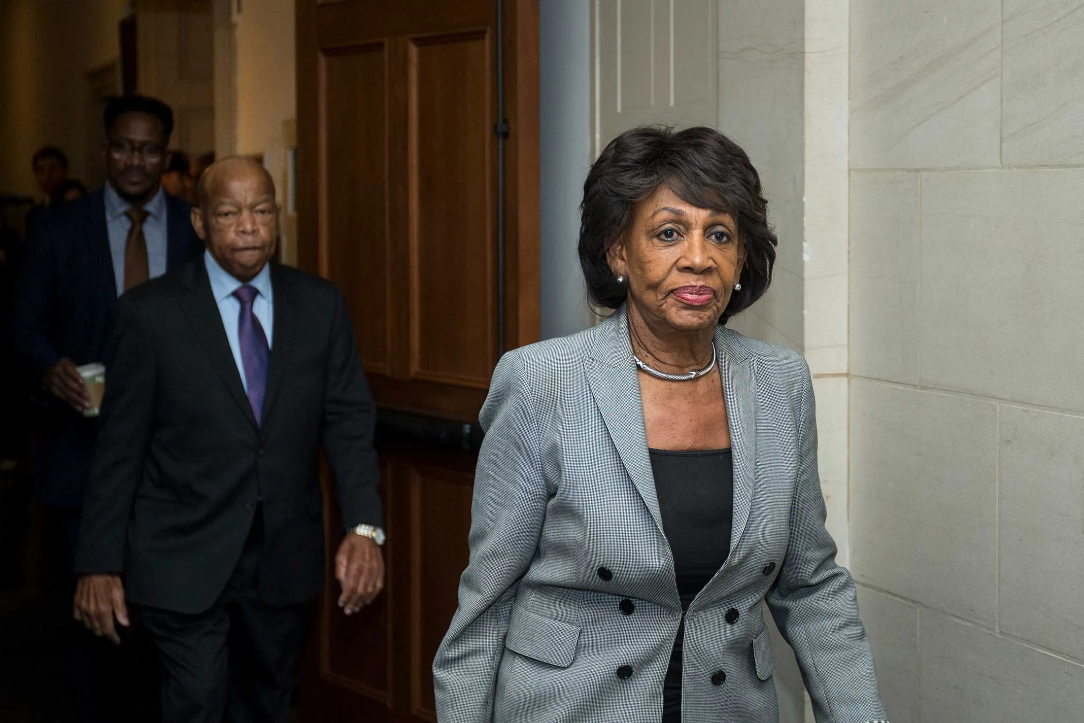Representative Maxine Waters (D-Calif.) exits a Democratic caucus meeting to elect new leadership on Capitol Hill on Nov. 28, 2018, in Washington.&nbsp;
