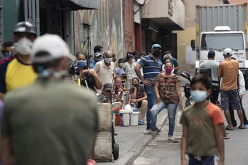 Venezuelans Line Up For Fuel And Water As Coronavirus Cases Slowly Rise