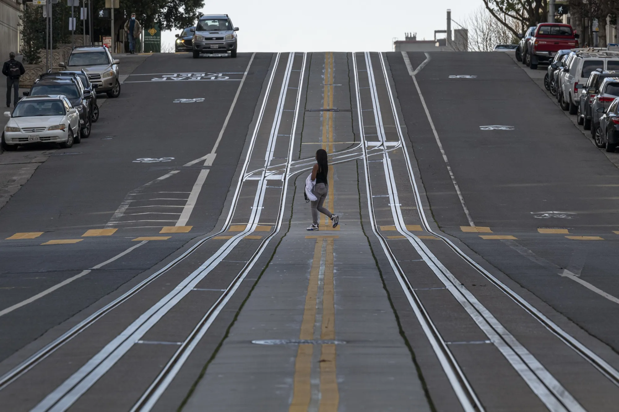 A pedestrian crosses California Street in San Francisco in 2020.&nbsp;