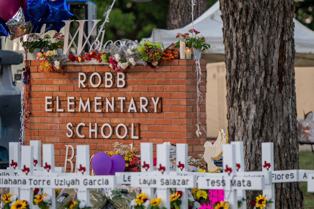 A memorial is seen following the mass shooting at Robb Elementary School on May 26, 2022 in Uvalde, Texas.