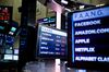 Monitors display FAANG stock information on the floor of the New York Stock Exchange (NYSE) in New York, U.S.