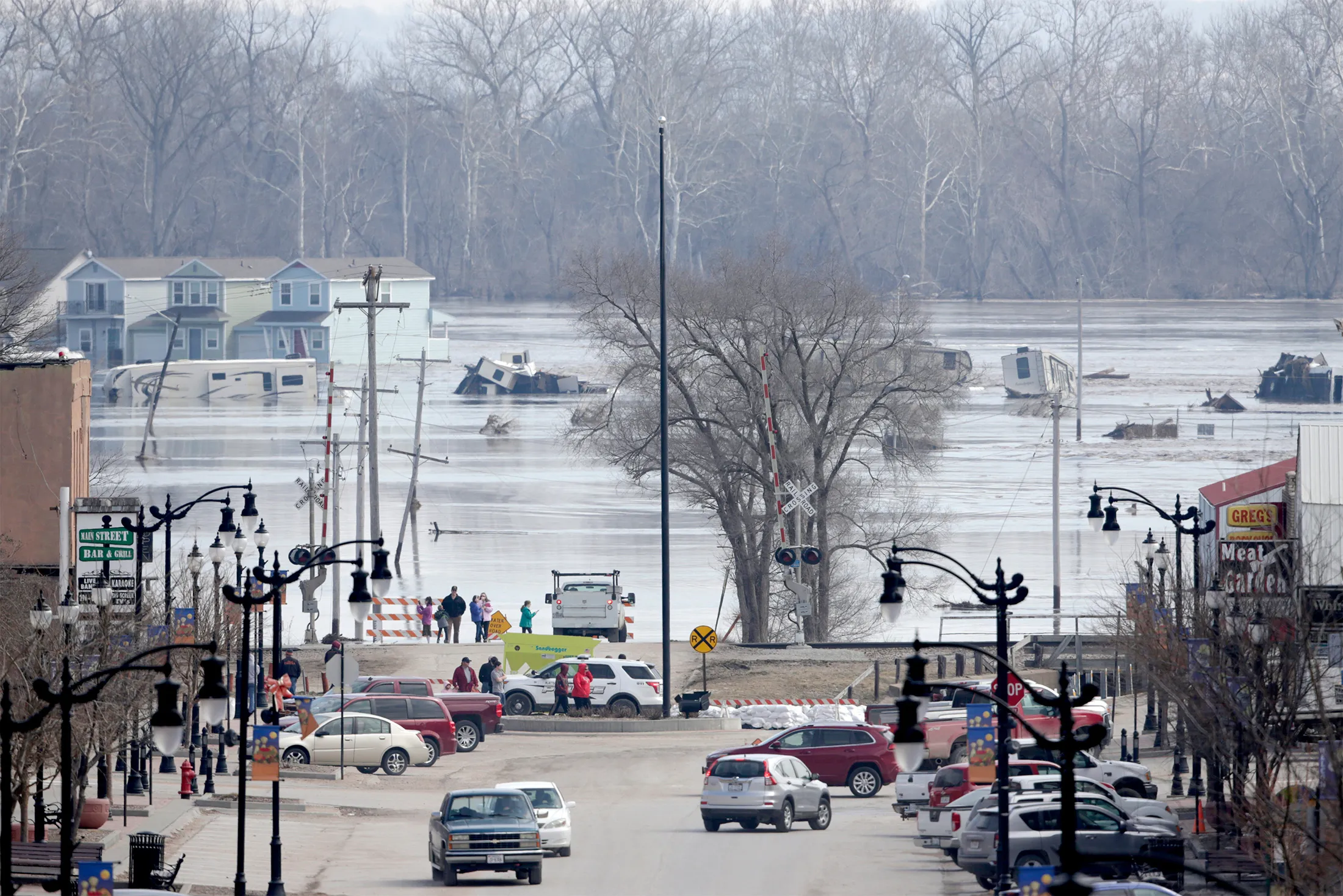 People view the rising waters from the Platte and Missouri rivers which flooded areas of Plattsmouth, Neb., on&nbsp;March 17.&nbsp;