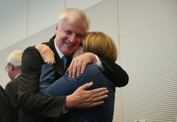 Merkel and Seehofer&nbsp;before their partnership started to unravel.