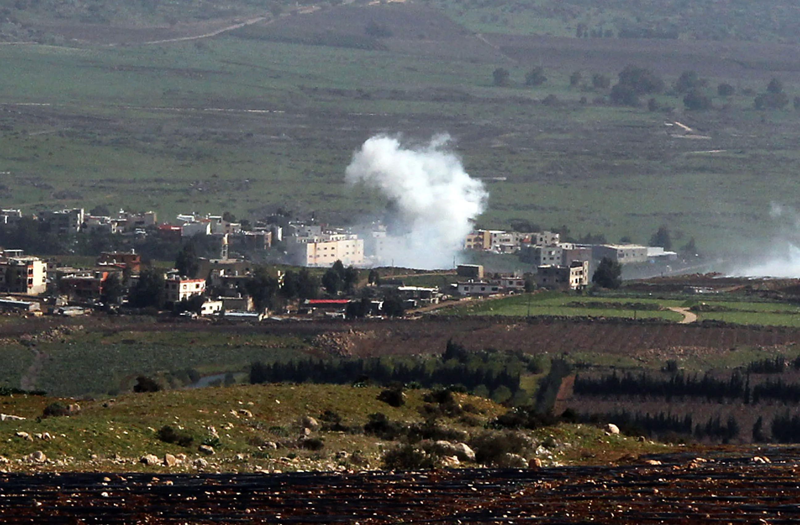 Smoke from Israeli shelling of the Lebanese town of Al-Majidiyah on the Lebanese border with Israel on Jan. 28, 2015.
