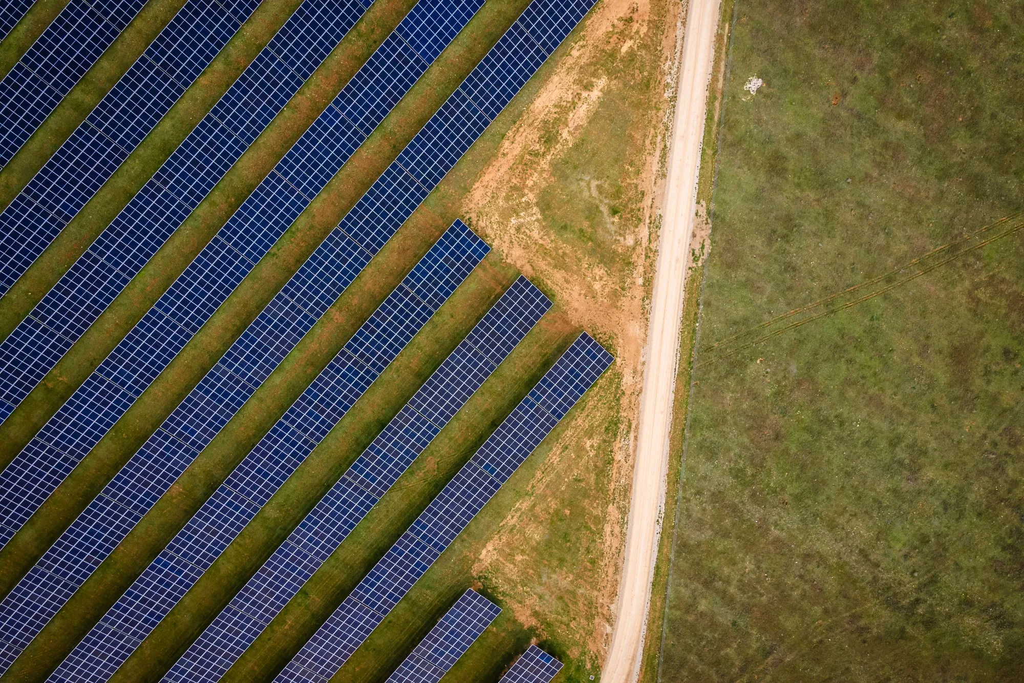 Rows of photovoltaic panels at the Iberdrola SA BaCa hybrid wind-solar plant in the Vallejera district of Burgos, Spain in February 2024.