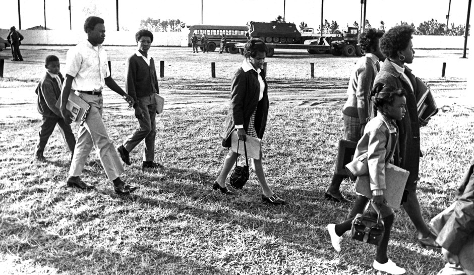 Black students walk to a desegregated school in 1970.